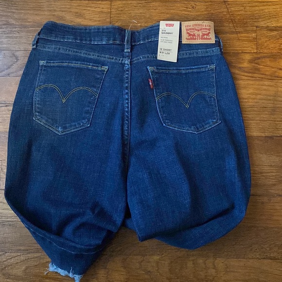 Levi's® 711 Destructed Mid Rise Skinny Jeans - Picture 7 of 9